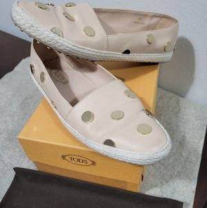 Brown with gold studs Tod's size 38